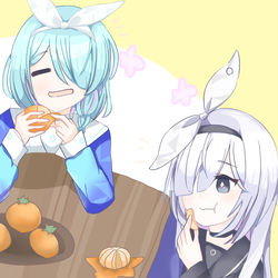 こたつでみかんをアロナ先輩に教えてもらうプラナちゃん